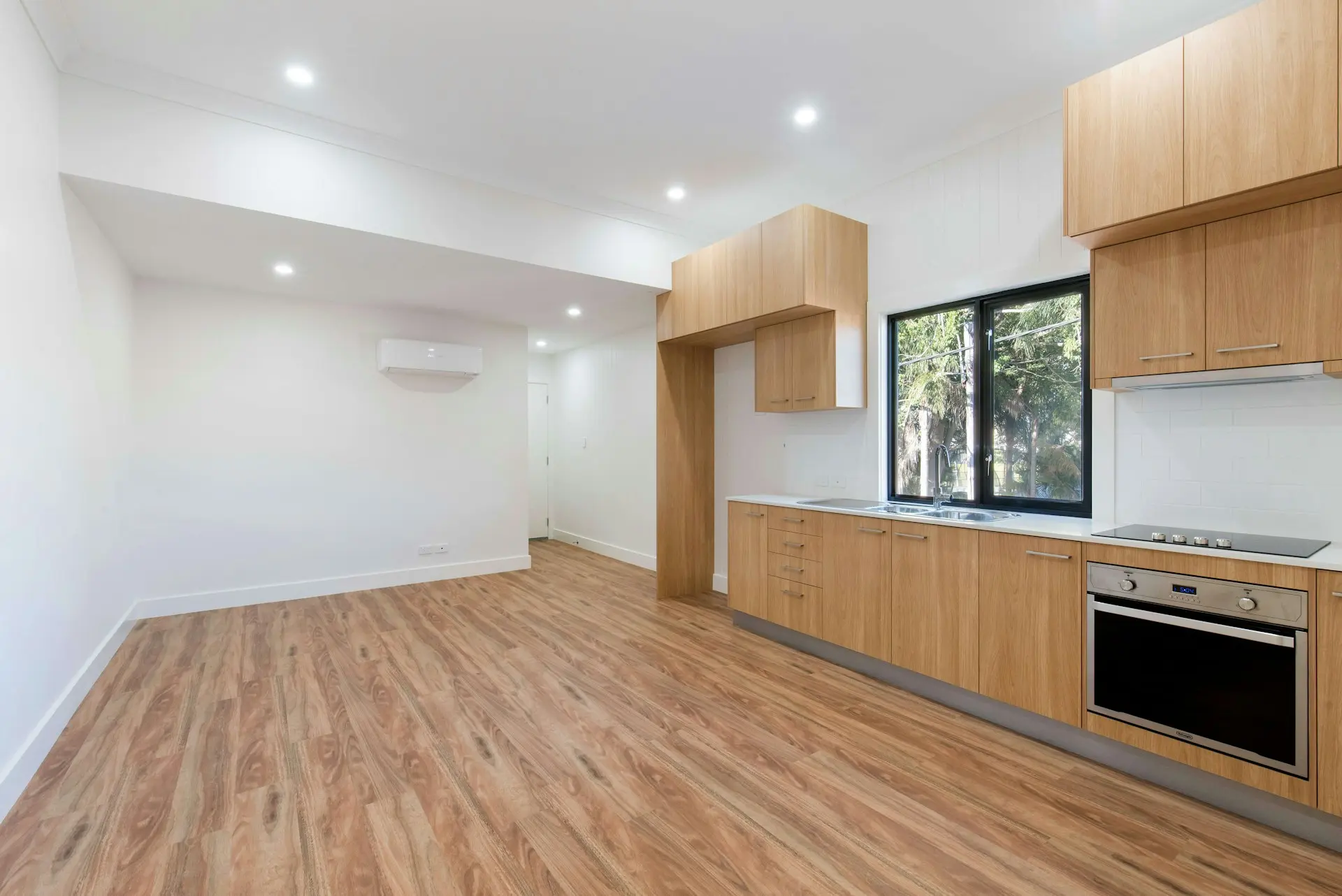 Wood-look vinyl flooring installation with a clean professional finish